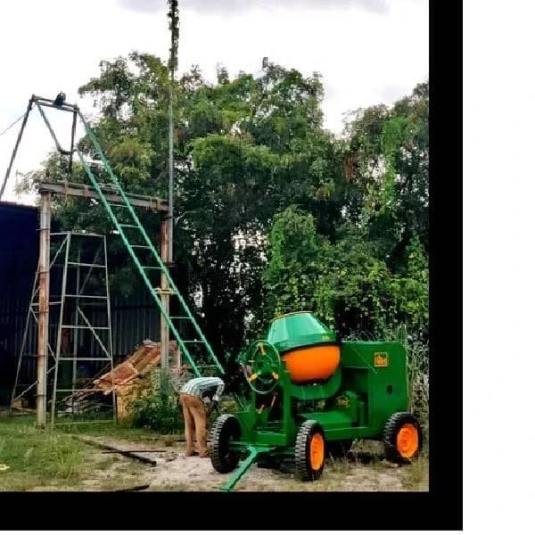 Lift attached concrete mixer