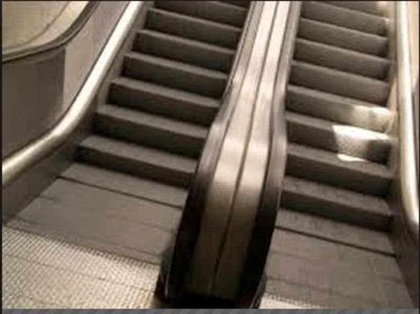 Moving Upward Escalator