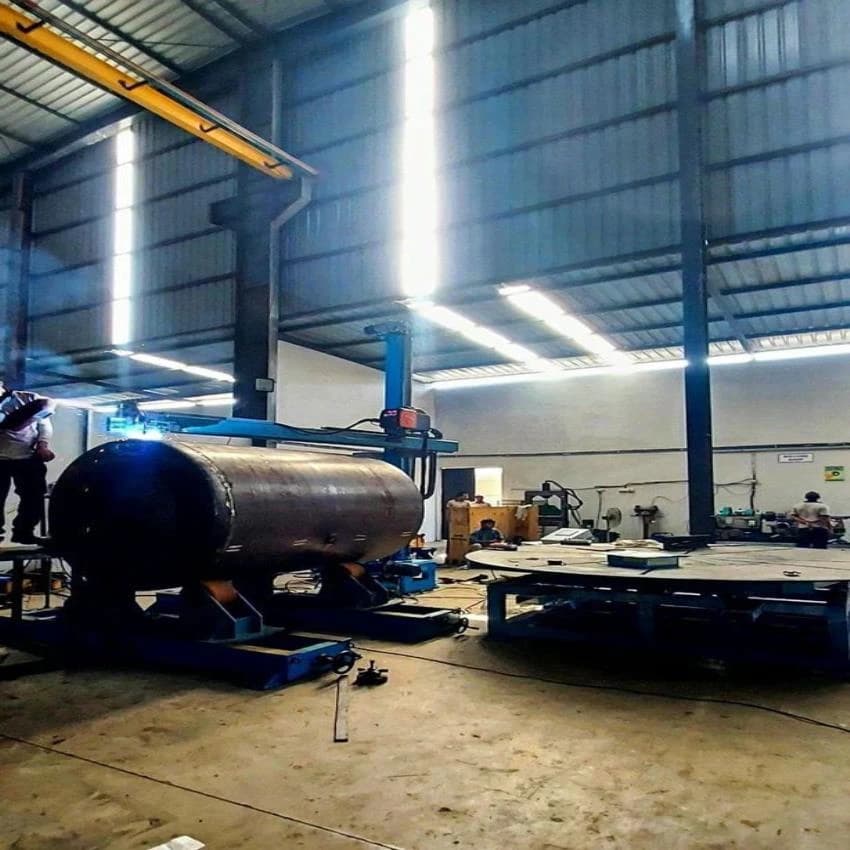 Column and boom welding system