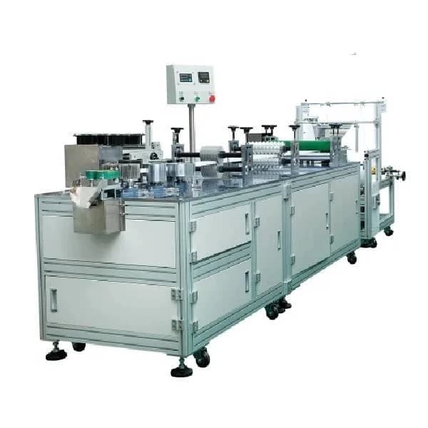 Shoe Cover Making Machine